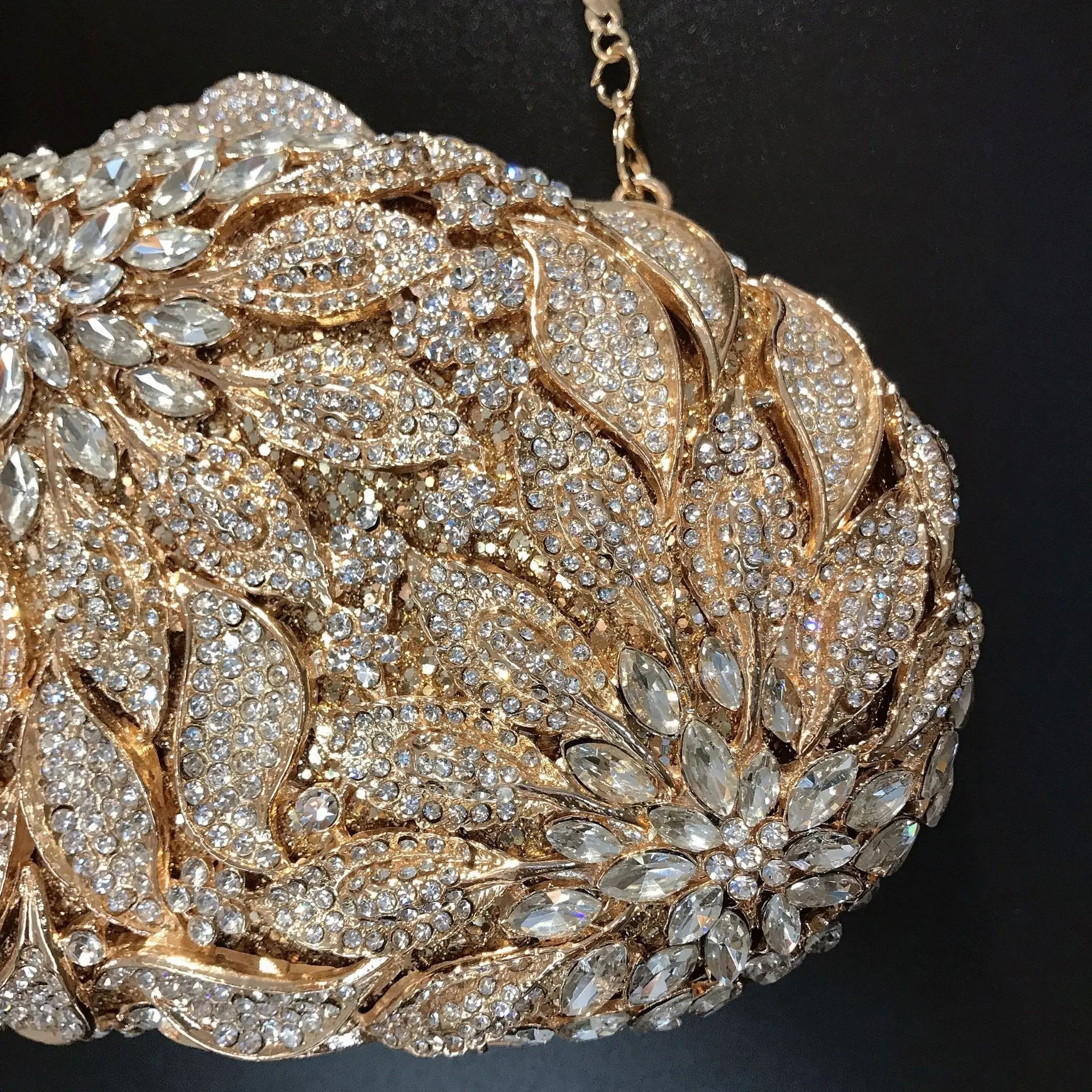 Gold metal leaves and white crystal evening clutch bag by MC THE BLACK DIAMOND, luxury women’s wedding party ball handbag with rhinestones.