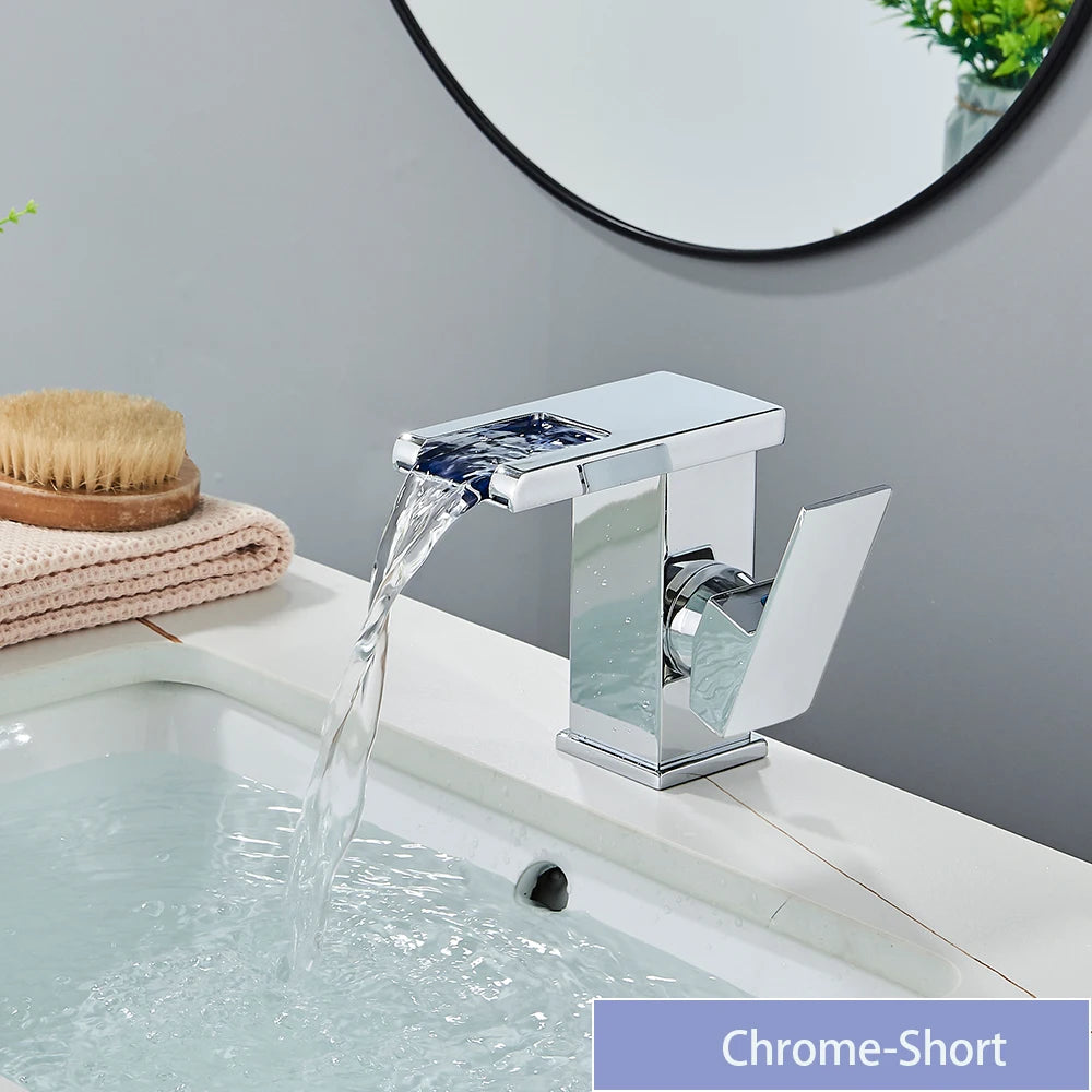 Black brass LED waterfall bathroom sink faucet with single handle, hot and cold water mixer, deck-mounted design by 𝕄𝕔 𝕋𝕙𝕖 𝔹𝕝𝕒𝕔𝕜 𝔻�