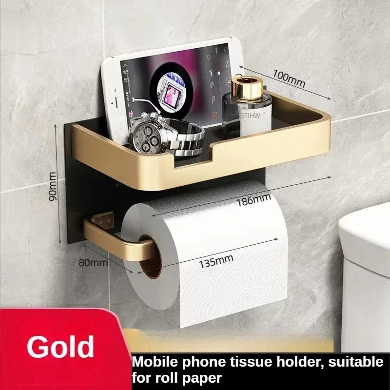 Black gold toilet paper holder from MC THE BLACK DIAMOND, mounted on bathroom wall for convenient tissue storage.