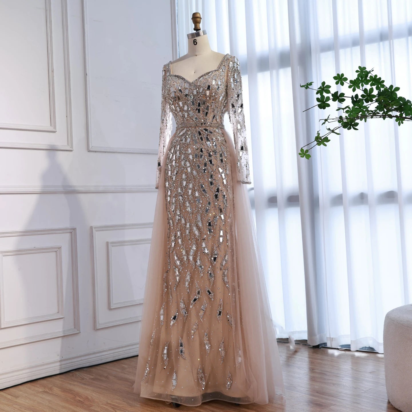 MC Luxury Arabic Nude Long Sleeve Mermaid Evening Dress by MC THE BLACK DIAMOND, featuring a fitted silhouette and elegant design.