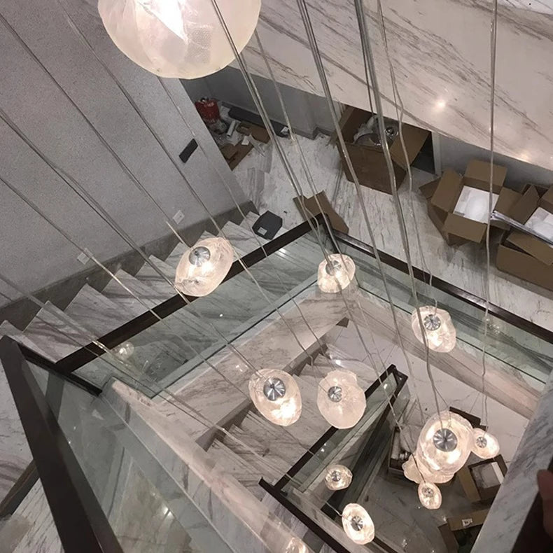 Nordic style MC THE BLACK DIAMOND pendant light hanging in a living room or bedroom stairway decoration.