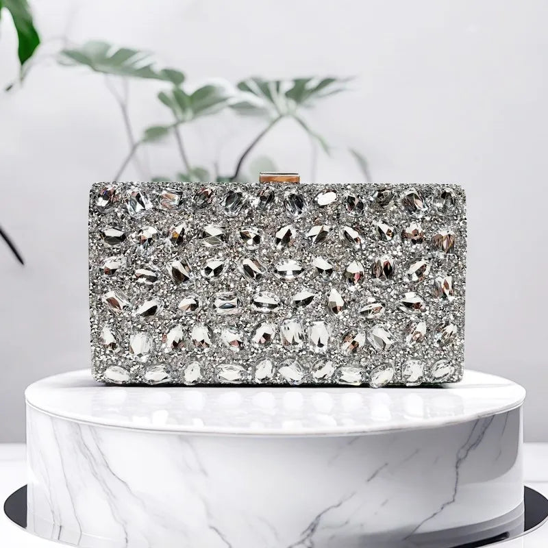 Elegant silver rhinestone clutch handbag by MC THE BLACK DIAMOND, perfect for weddings, proms, and formal evening events.