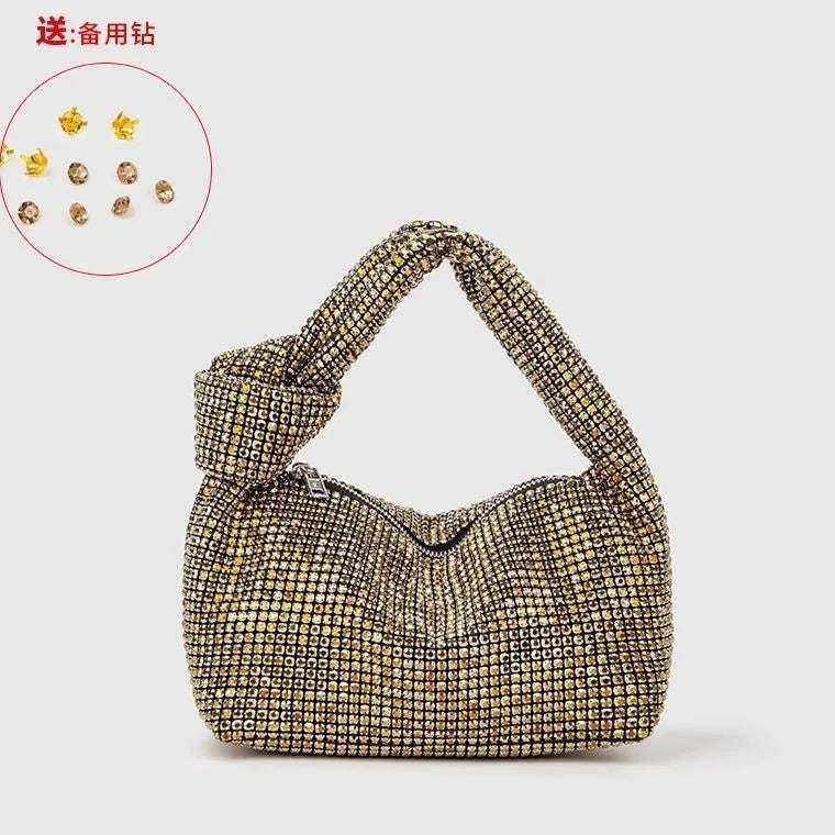 Silver crystal handle evening bag with rhinestone knot detail by MC THE BLACK DIAMOND, elegant tote for women’s luxury purses and handbags.