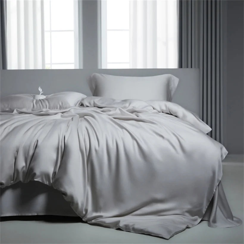 Luxurious MC Collection 100% Mulberry Silk Bedding Set with smooth, shiny silk sheets and pillowcases in elegant home decor style.