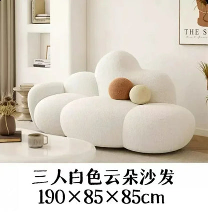 White MC THE BLACK DIAMOND living room sofa with plush cushions, designed for comfort and relaxation in modern furniture style.