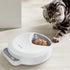Wireless automatic pet feeder for cats and dogs by MC THE BLACK DIAMOND, dispensing wet and dry food with 4 meal capacity.