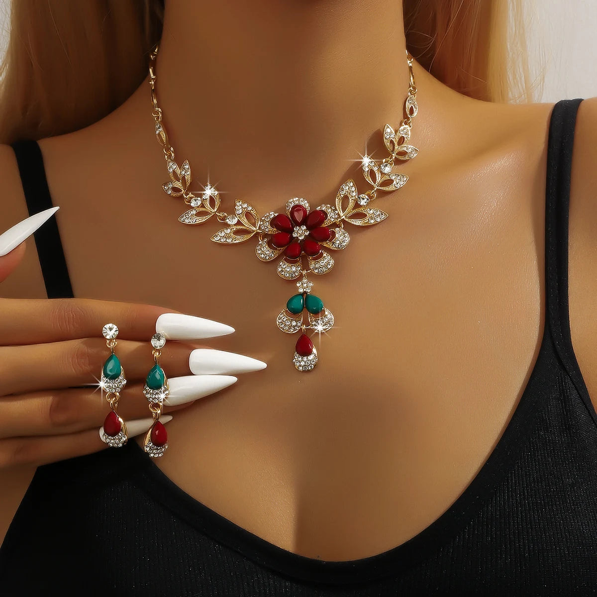 Three-piece women's black and gold flower necklace set from 𝕄𝕔 𝕋𝕙𝕖 𝔹𝕝𝕒𝕔𝕜 𝔻𝕚𝕒𝕞𝕠�
