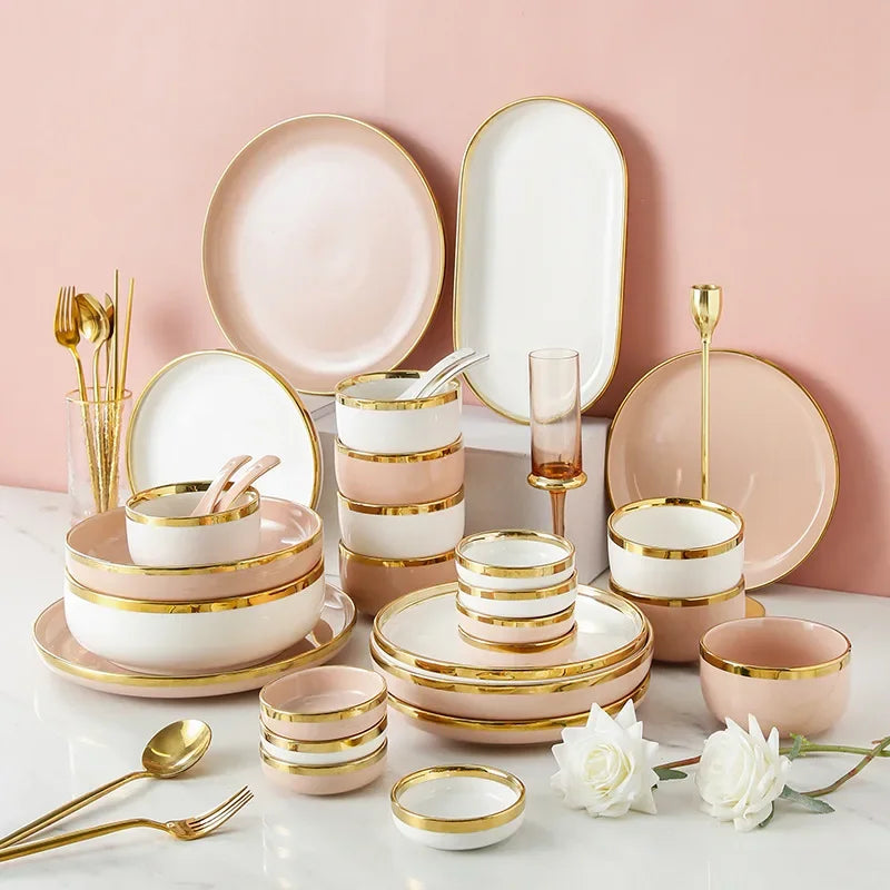 Set of bright white and pink porcelain plates with gold accents from MC THE BLACK DIAMOND, ideal for elegant kitchen tableware.