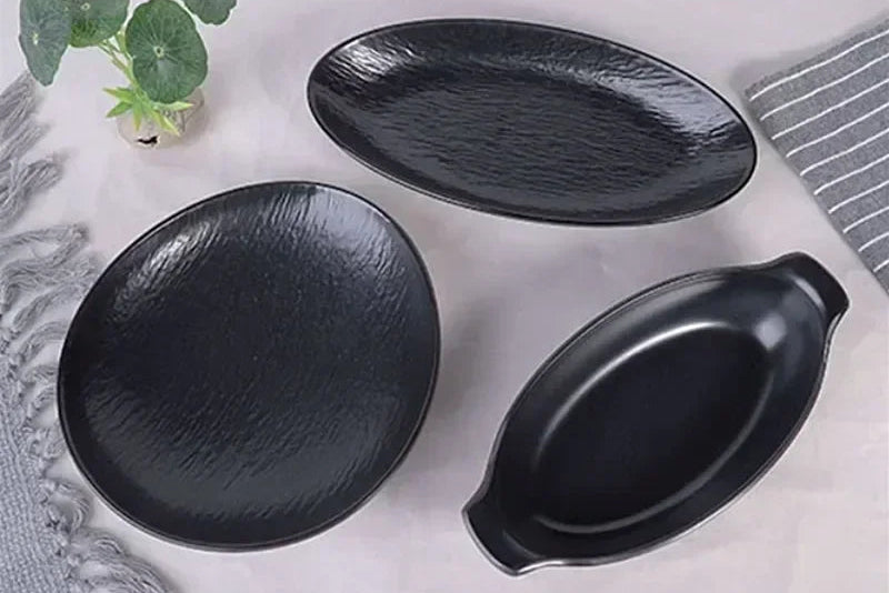Black frosted melamine dinner plate from Mc The Black Diamonds, suitable for sushi, snacks, and fruits, durable and break-resistant.