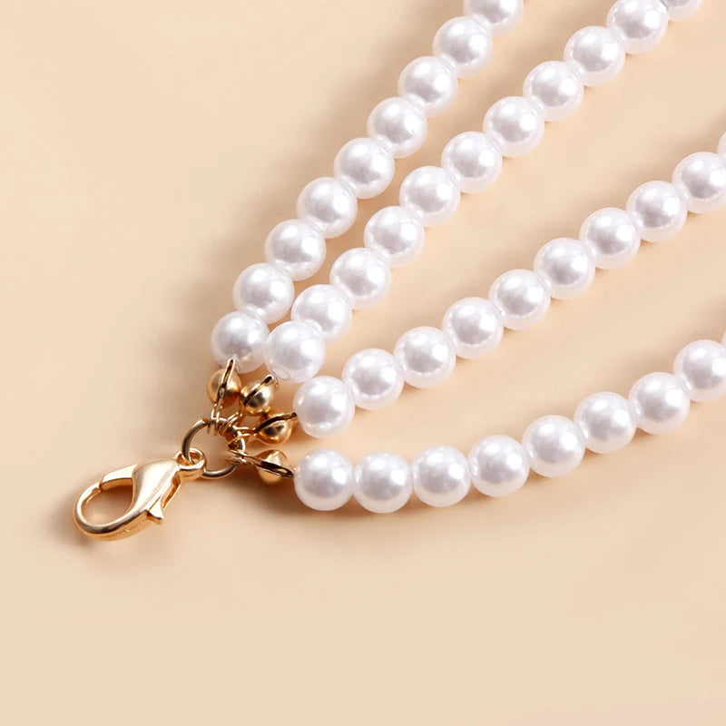 Multilayer pearl waist chain for women featuring imitation pearls, metal rings, and tassel accents, stylish body jewelry by 𝕄𝕔 𝕋𝕙𝕖 𝔹𝕝𝕒𝕔𝕜 �