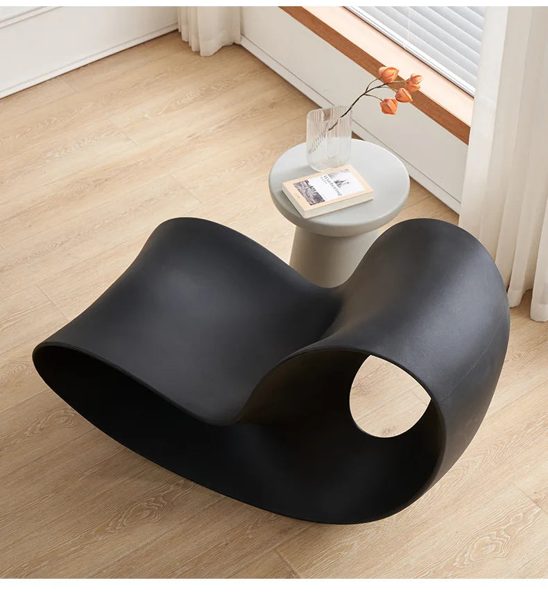 Modern MC THE BLACK DIAMOND rocking lounge chair made of rotational-molded polyethylene, stylish armchair for contemporary home decor