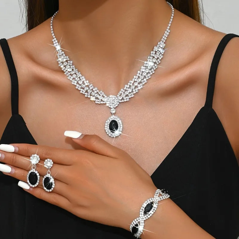Elegant bridal jewelry necklace and earrings set with sparkling rhinestones by 𝕄𝕔 𝕋𝕙𝕖 𝔹𝕝𝕒𝕔𝕜 𝔻𝕚𝕒𝕞�