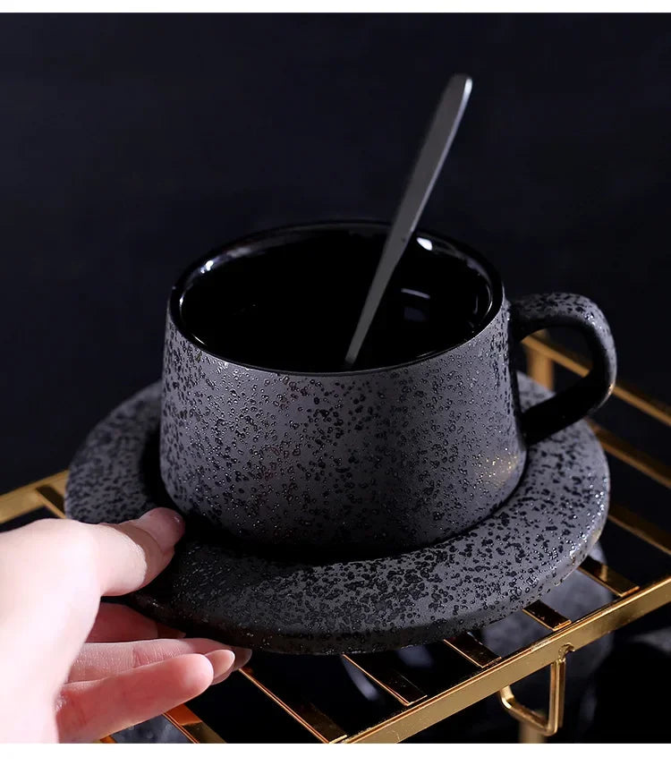 Frosted ceramic coffee cup and saucer set with black spoon and cup holder, from 𝕄𝕔 𝕋𝕙𝕖 𝔹𝕝𝕒𝕔𝕜 𝔻𝕚�