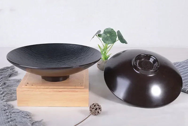 Black frosted melamine dinner plate from 𝕄𝕔 𝕋𝕙𝕖 𝔹𝕝𝕒𝕔𝕜 𝔻𝕚𝕒𝕞𝕠𝕟