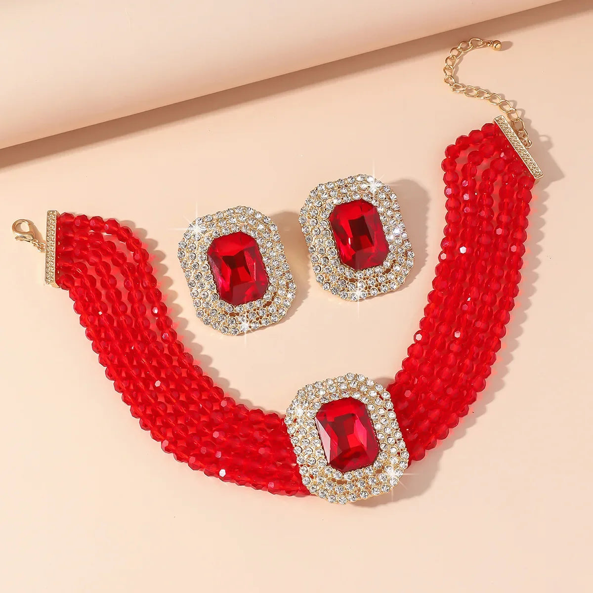 MC THE BLACK DIAMOND jewelry set featuring multilayer champagne red white black crystal necklace and geometric square earrings for women.