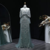 Beaded grey Arabic evening dress by MC THE BLACK DIAMOND featuring intricate beading and elegant design.