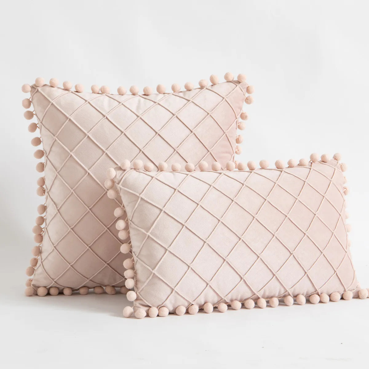 Yellow and orange velvet lumbar pillow covers with diamond stripes, pompoms, and tassels, 30x50cm and 45x45cm, by MC THE BLACK DIAMOND.