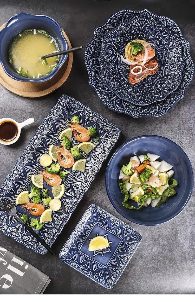 Blue retro relief ceramic kitchen dishes set with intricate patterns, crafted by 𝕄𝕔 𝕋𝕙𝕖 𝔹𝕝𝕒𝕔𝕜 𝔻𝕚𝕒𝕞�