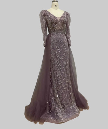MC THE BLACK DIAMOND long sleeve evening dress for women, elegant black gown with fitted design and stylish neckline.