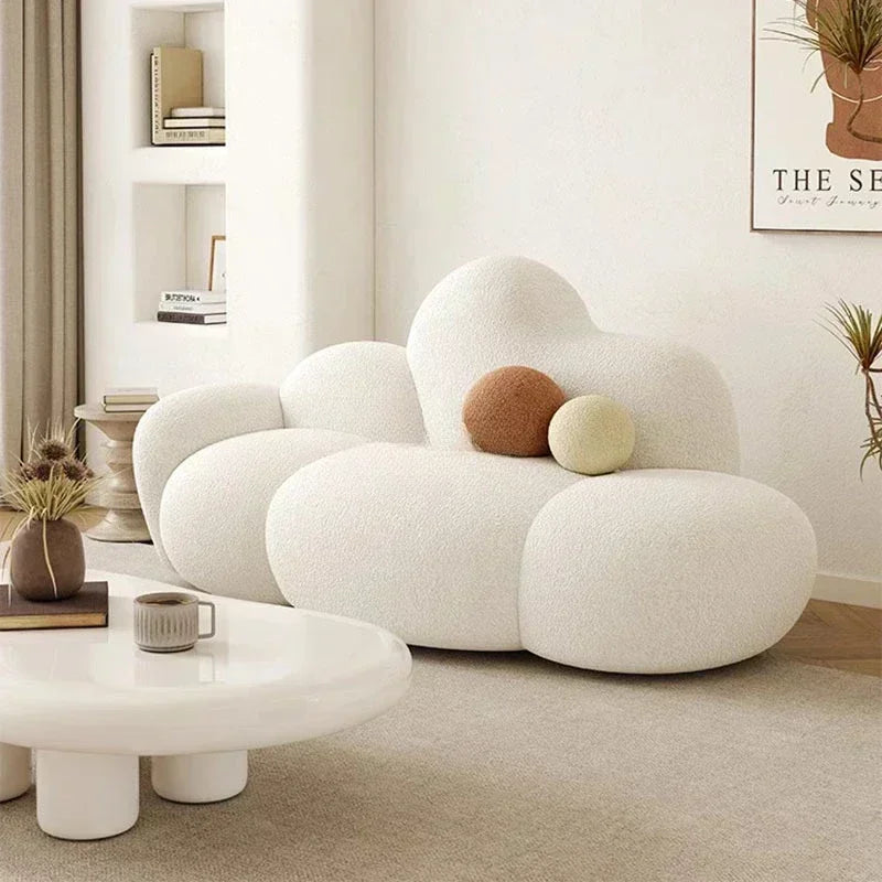 White MC THE BLACK DIAMOND living room sofa with plush cushions, perfect for relaxing and outdoor lounging in a modern furniture setting.