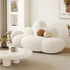 White MC THE BLACK DIAMOND living room sofa with plush cushions, perfect for relaxing and outdoor lounging in a modern furniture setting.