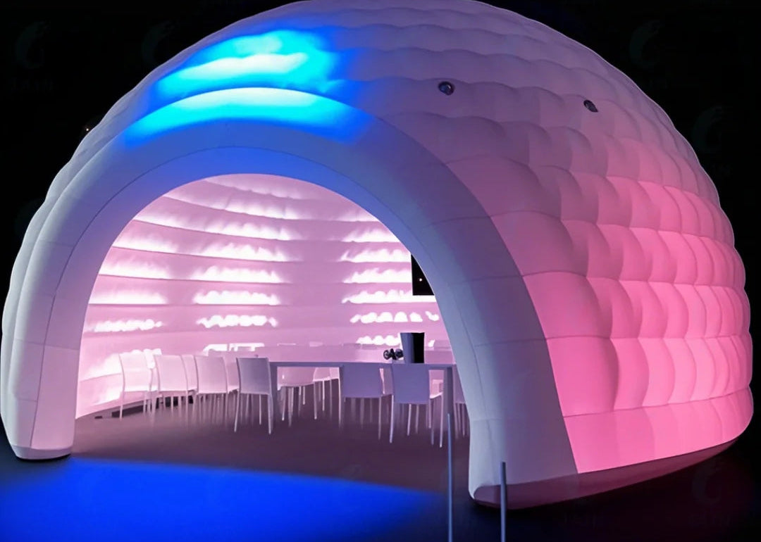 MC THE BLACK DIAMOND inflatable igloo dome tent set up outdoors, showcasing its pop-up design and spacious air-filled structure.