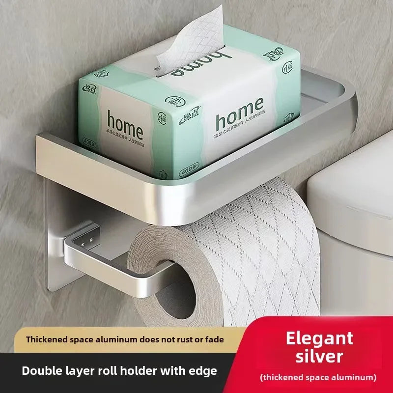 Black Gold toilet paper holder by MC THE BLACK DIAMOND, mounted on bathroom wall with sleek, modern design.