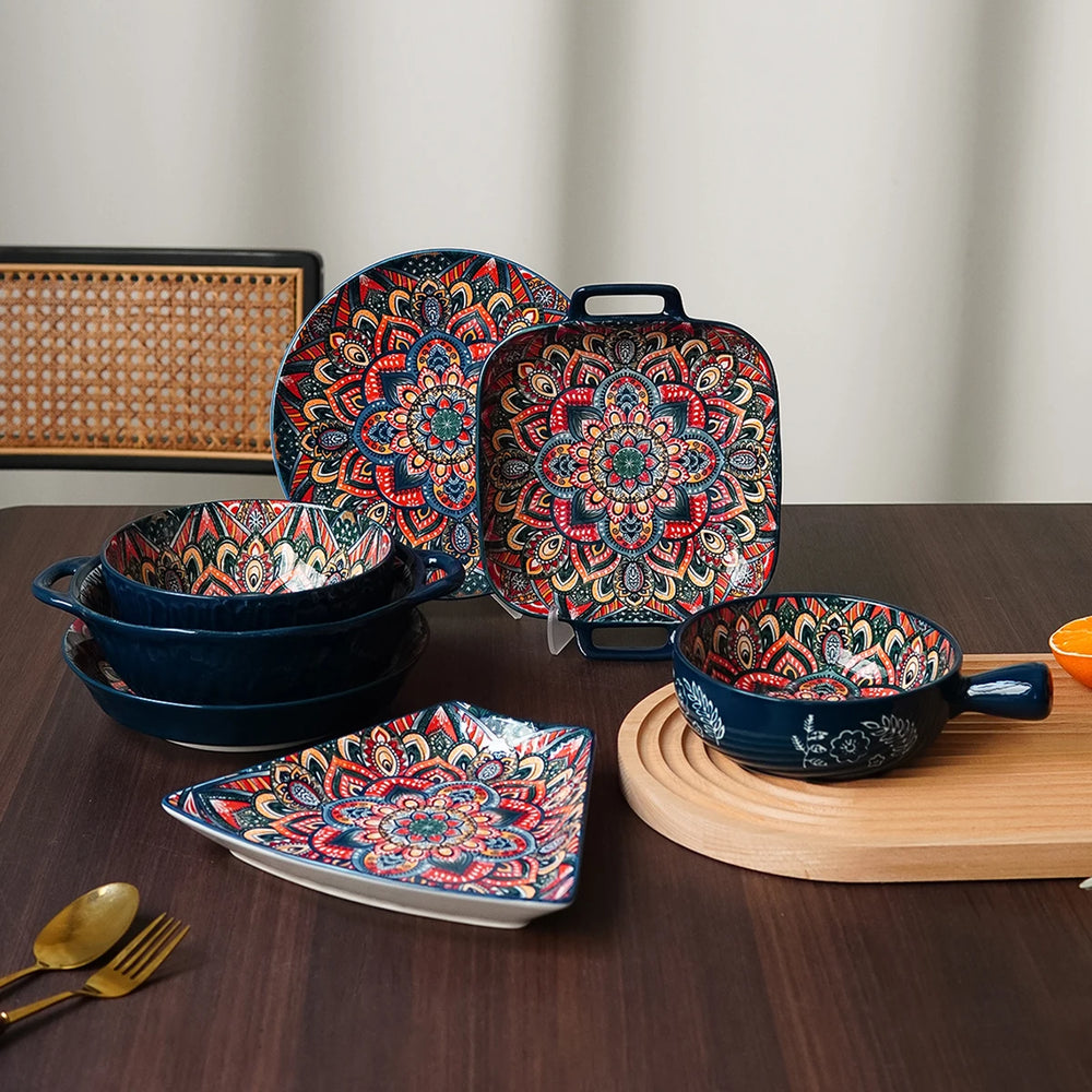 Bohemian ceramic dinnerware set with unique floral patterns by MC THE BLACK DIAMOND, showcasing plates and bowls on a table.