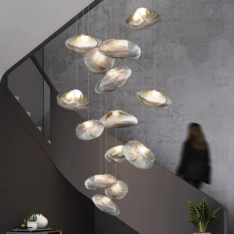 Modern MC THE BLACK DIAMOND crystal chandelier with elegant hanging crystals and intricate metal framework for home decor lighting.