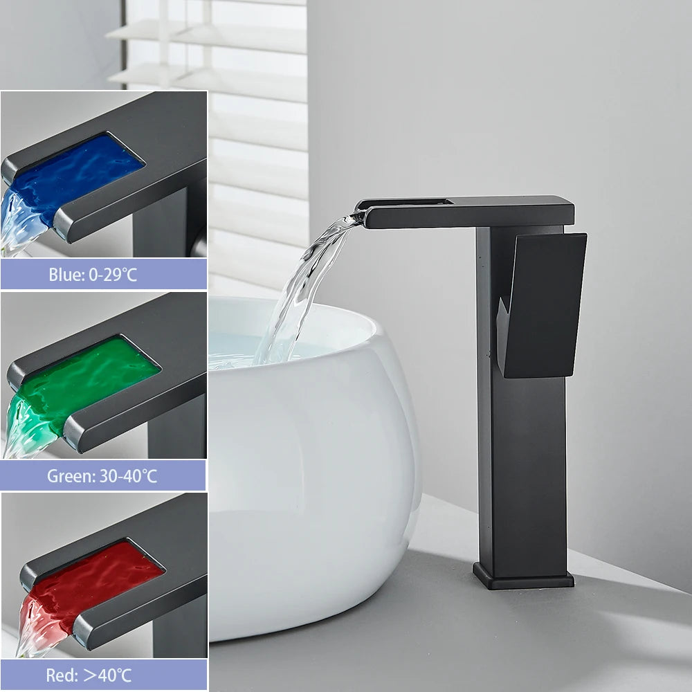 Black brass LED waterfall bathroom sink faucet with single handle, deck-mounted hot and cold water mixer from 𝕄𝕔 𝕋𝕙𝕖 𝔹𝕝𝕒𝕔𝕜 𝔻𝕚�