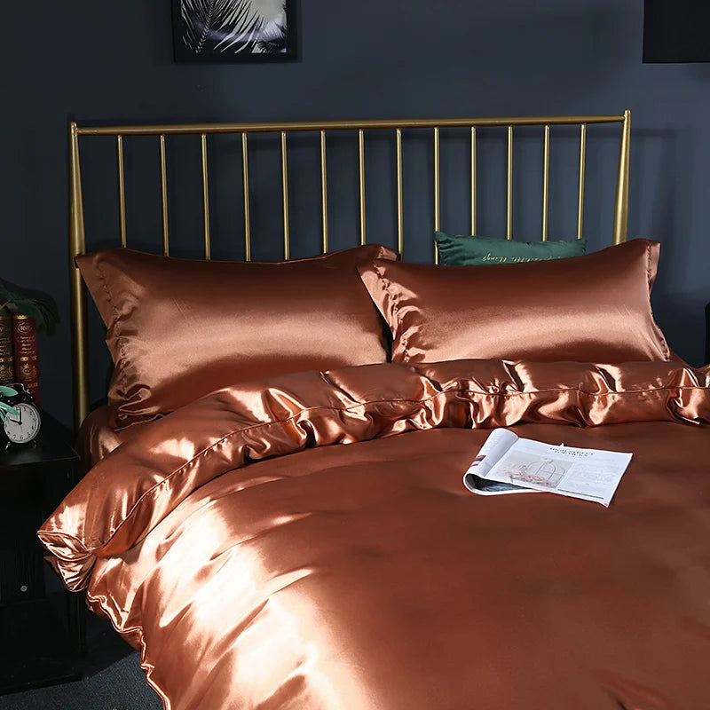 Luxurious silk bedding set with duvet cover, fitted sheet, flat sheet, and pillowcases in solid color, king and queen sizes.