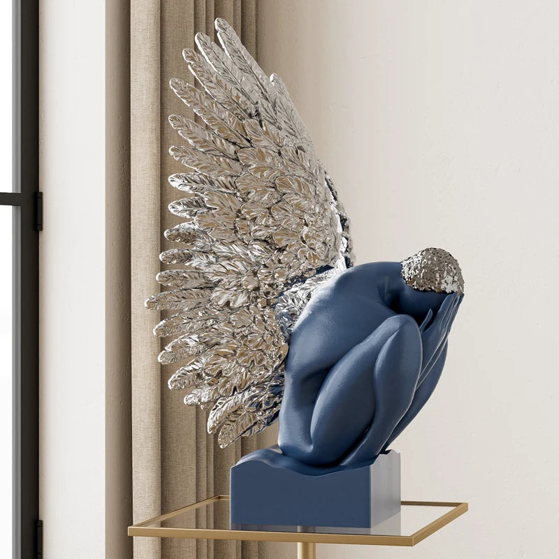 MC THE BLACK DIAMOND desk decoration wings statue, artistic metal sculpture for office decor, detailed wing design for a stylish workspace.