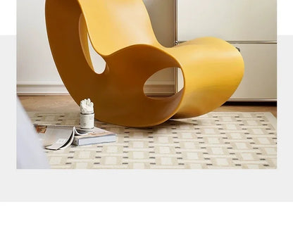 Modern MC THE BLACK DIAMOND rocking PE plastic lounge armchair with a sleek, rotational-molded design for contemporary home decor.