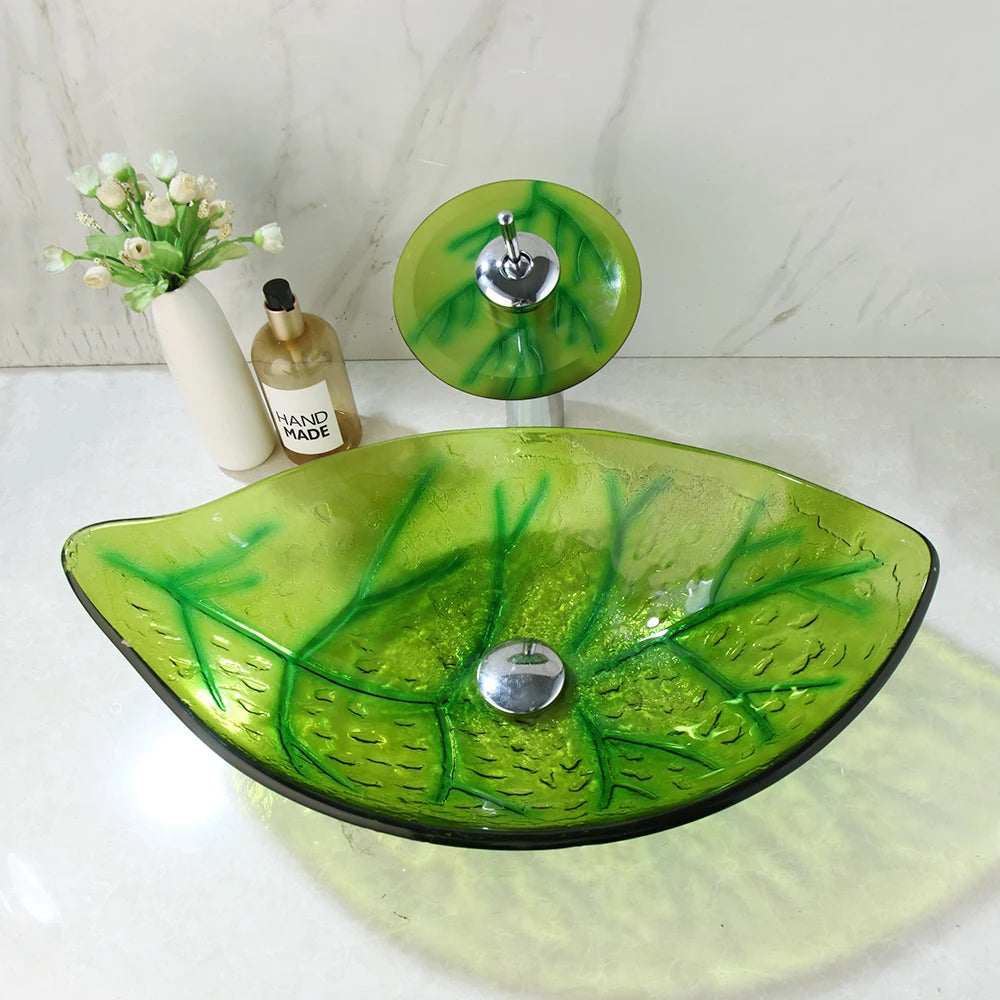 Green leaf-shaped vessel sink by MC THE BLACK DIAMOND, modern bathroom wash basin with natural leaf design.
