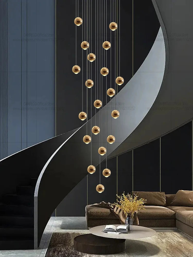 Modern MC THE BLACK DIAMOND LED staircase pendant light hanging in a living room, showcasing sleek design and ambient lighting.