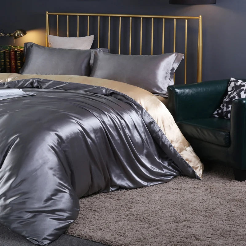 Luxury silk bedding set with duvet cover, fitted sheet, flat sheet, and pillowcases in solid color, king and queen sizes.