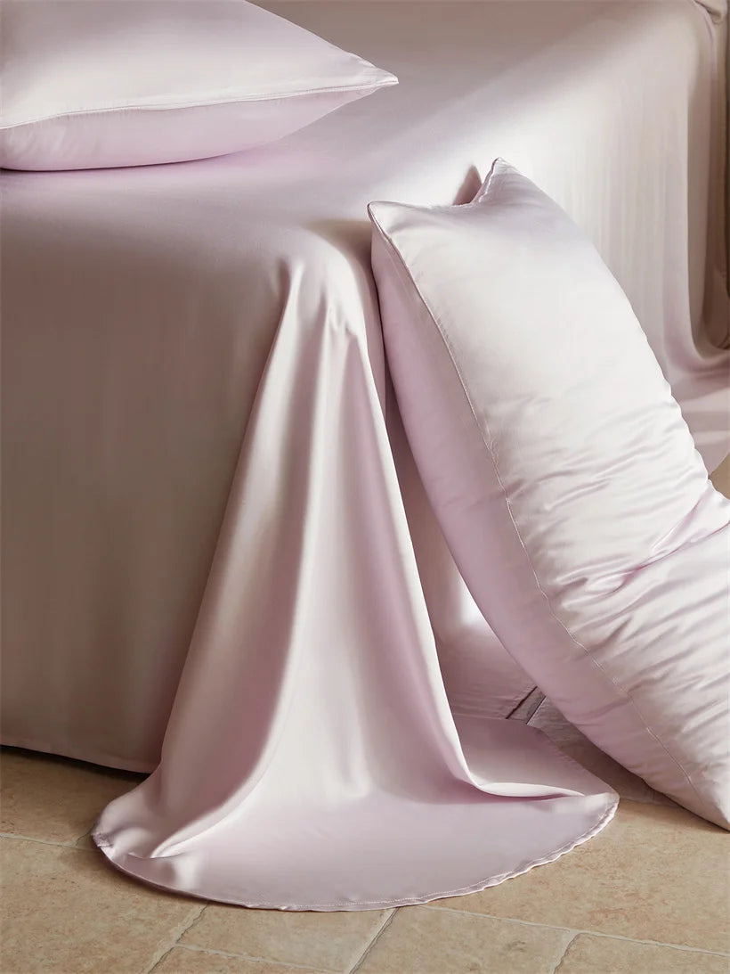 MC Collection 100% Mulberry Silk Bedding Set showcasing smooth silk pillows and duvet cover in elegant home decor style.