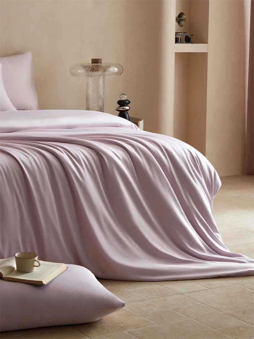 MC Collection 100% Mulberry Silk Bedding Set featuring smooth silk sheets and pillowcases, showcasing luxurious home decor by 𝕄𝕔 𝕋𝕙𝕖 𝔹𝕝𝕒𝕔𝕜 𝔻