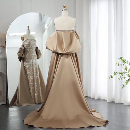 Elegant MC THE BLACK DIAMOND MC Luxury Dubai evening dress in sage green with a cape, perfect for weddings and parties.