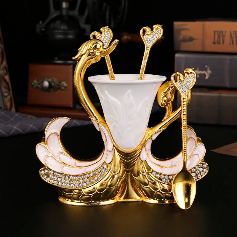 Swan-shaped fruit fork and spoon set from 𝕄𝕮 𝕋𝕙𝕖 𝔹𝕝𝕒𝕔𝕜 𝔻𝕚𝕒𝕞𝕠�