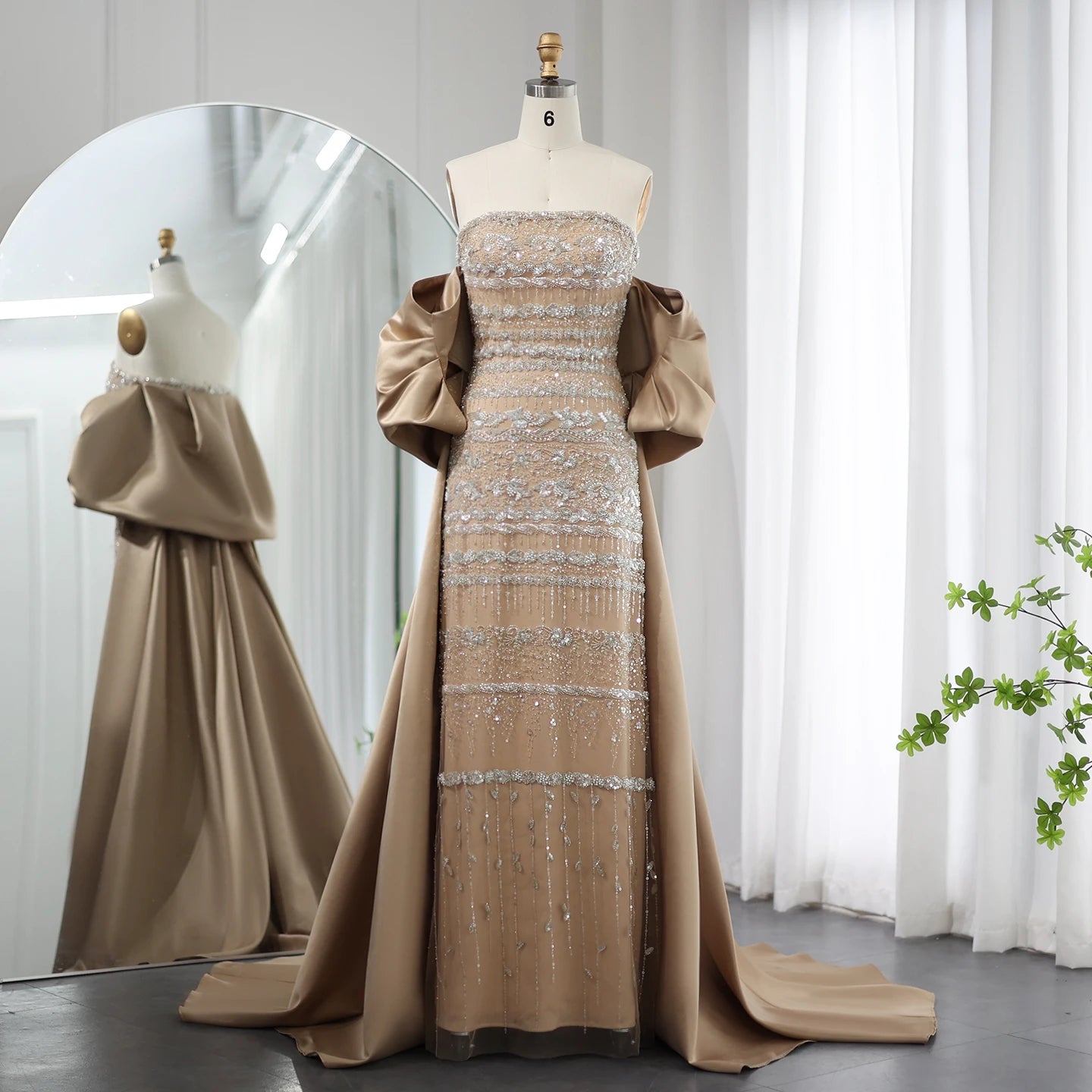 MC THE BLACK DIAMOND luxury Dubai sage green evening dress with cape, blue sky lilac accents, perfect for wedding and party events.