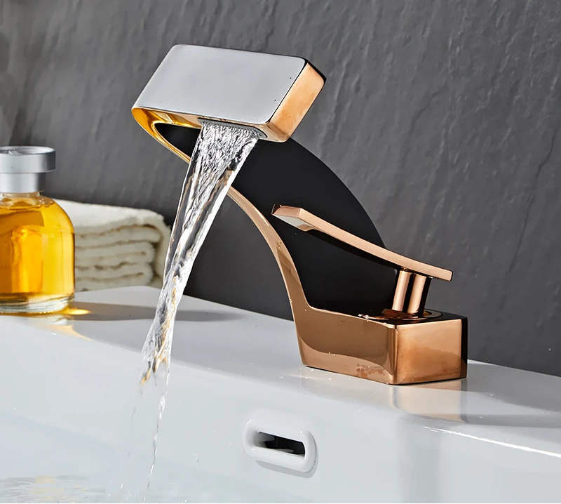 Black and gold brass bathroom sink faucet from 𝕄𝕮 𝕋𝕙𝕖 𝔹𝕝𝕒𝕔𝕜 𝔻𝕚𝕒𝕞𝕠𝕟