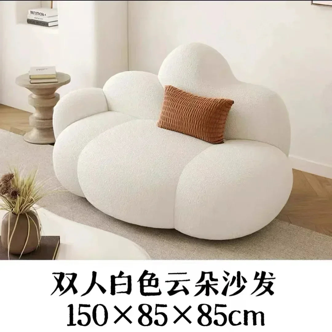 White MC THE BLACK DIAMOND living room sofa with plush cushions, perfect for relaxing and outdoor lounge furniture.