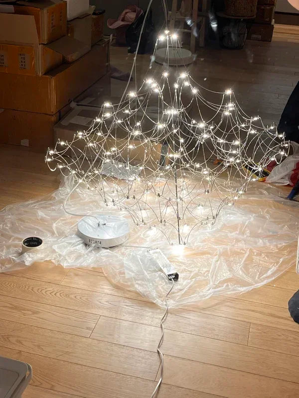 Modern chrome-plated luxury crystal chandelier from MC THE BLACK DIAMOND, featuring intricate crystal details and elegant chandelier lighting design.