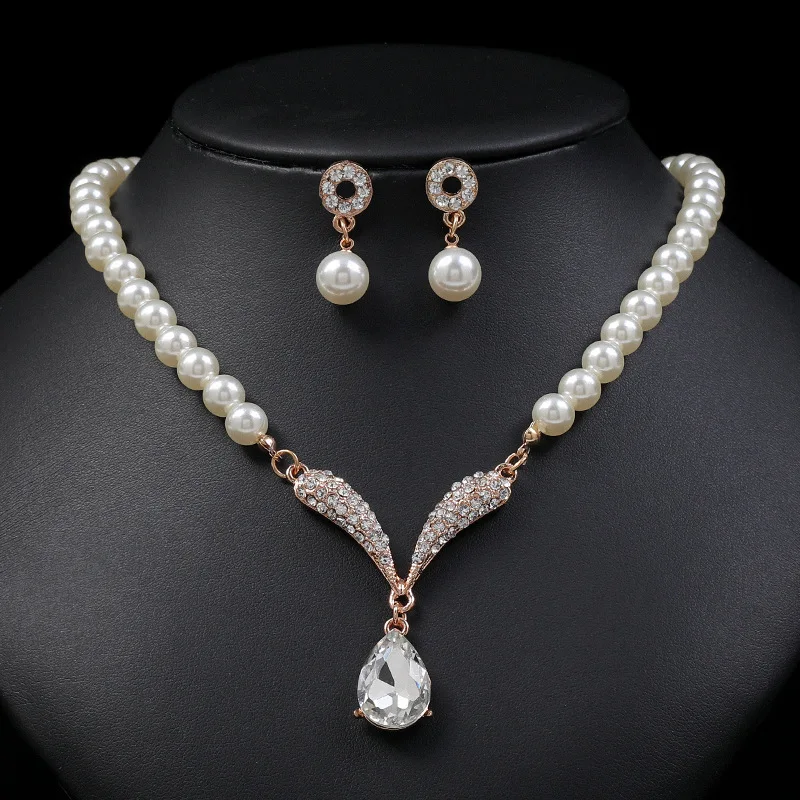 Mohammad Collection women's 3-piece pearl jewelry set with gold necklace and matching earrings for versatile styling.